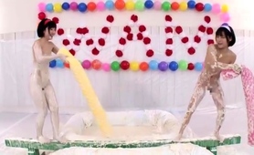 Two Exciting Oriental Teens Indulging In Wild Lesbian Fun