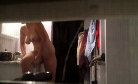 Voyeur Spying On A Stacked Amateur Blonde In The Bathroom